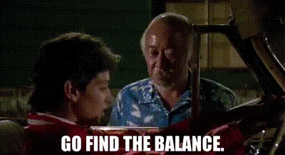 Mr. Miyagi and Daniel LaRusso in The Karate Kid, captioned “Go find the balance.”